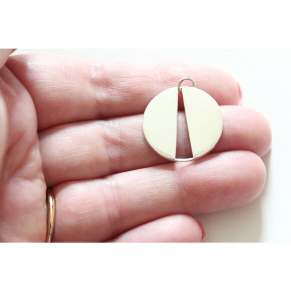 Sterling Silver Circle Pendant with Long Triangle Cutout - Picture 1 of 5
